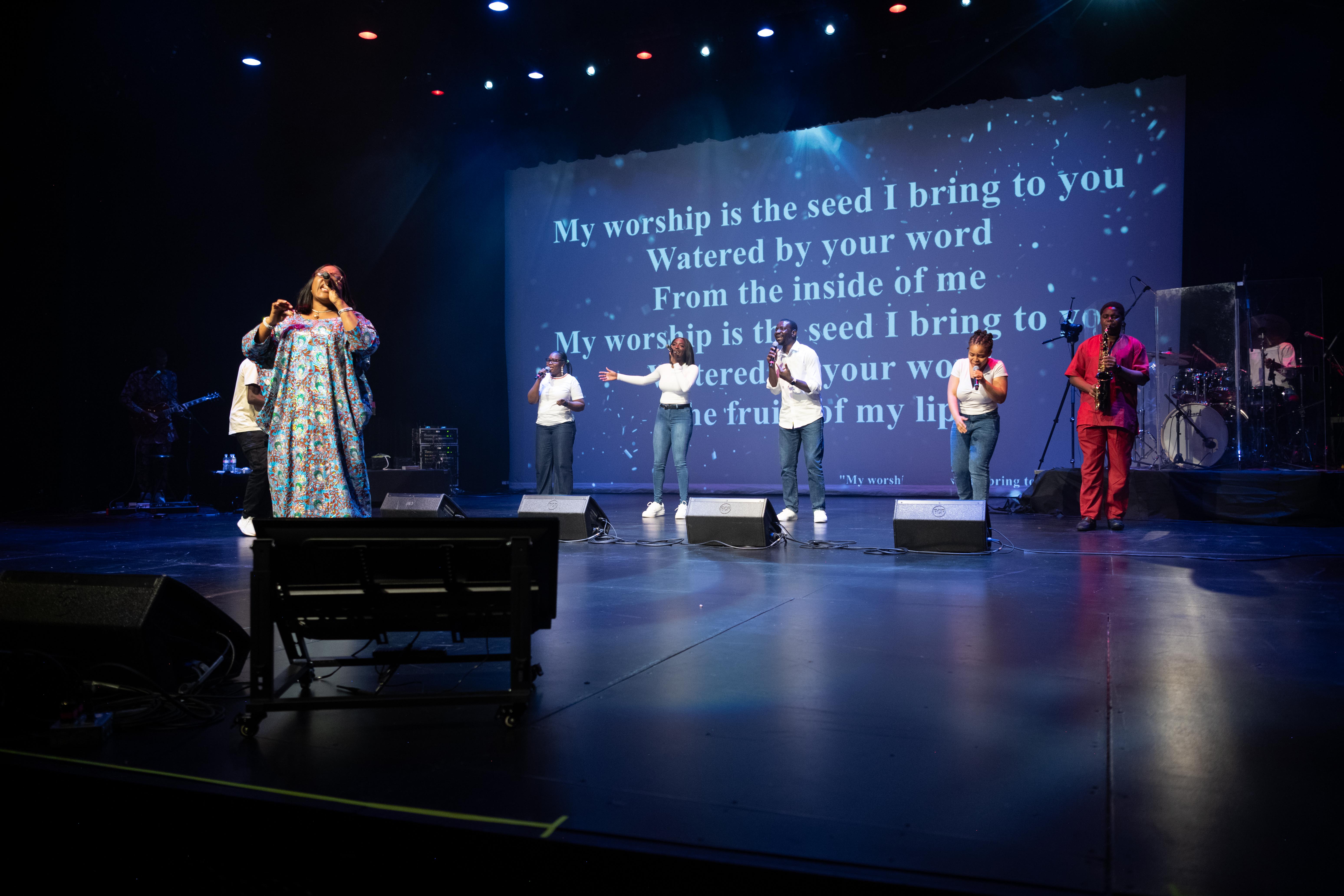 Worship team performing on stage